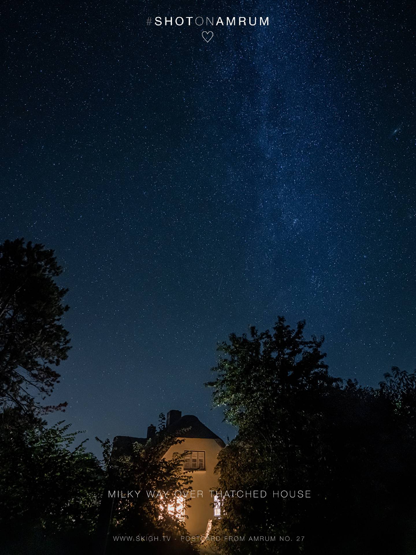 Milky Way over thatched house