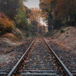 Railway tracks into the autumn