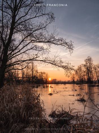 Frozen lake before sunset