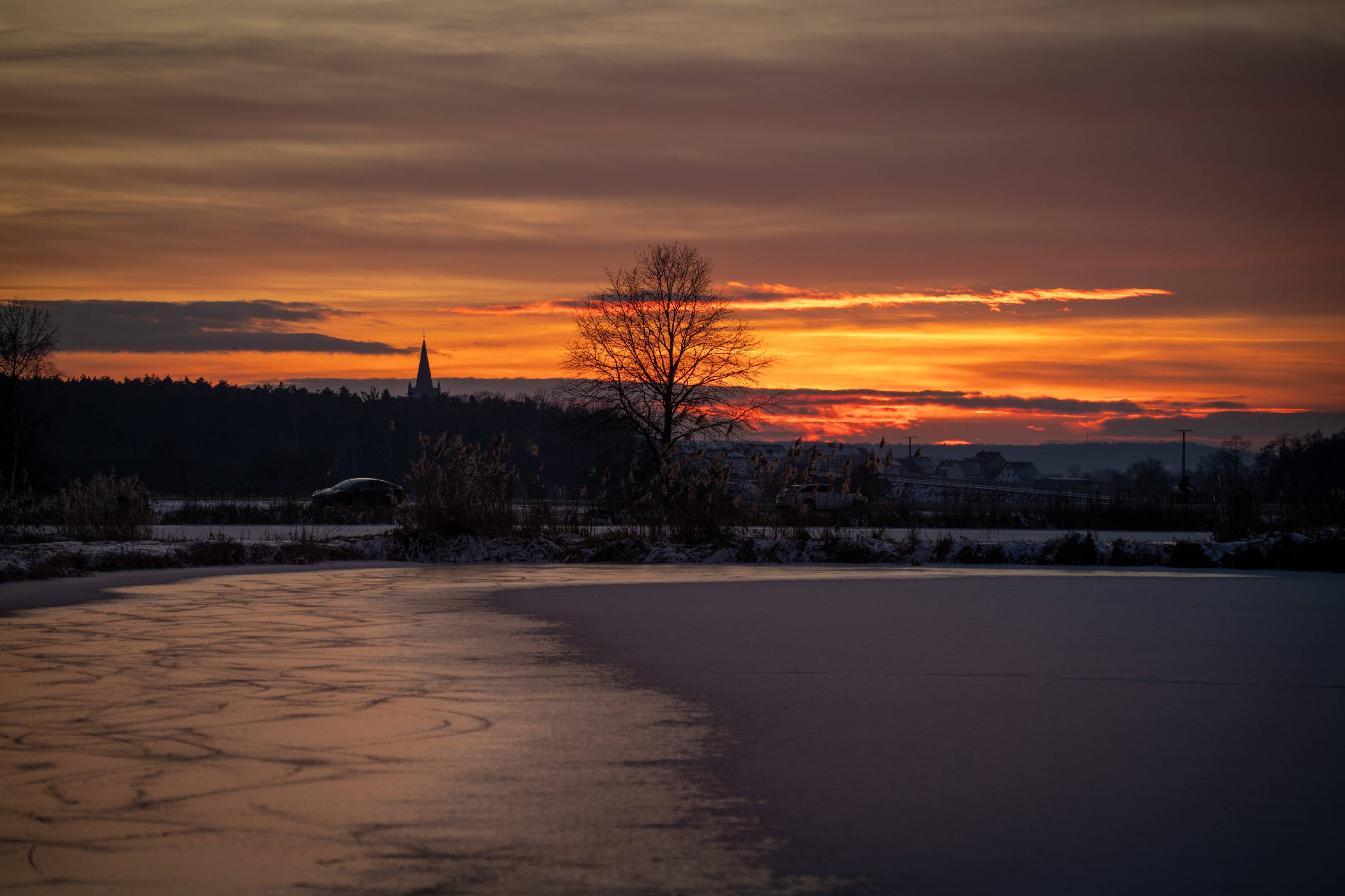 Frozen lake after sunset