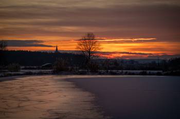 Frozen lake after sunset