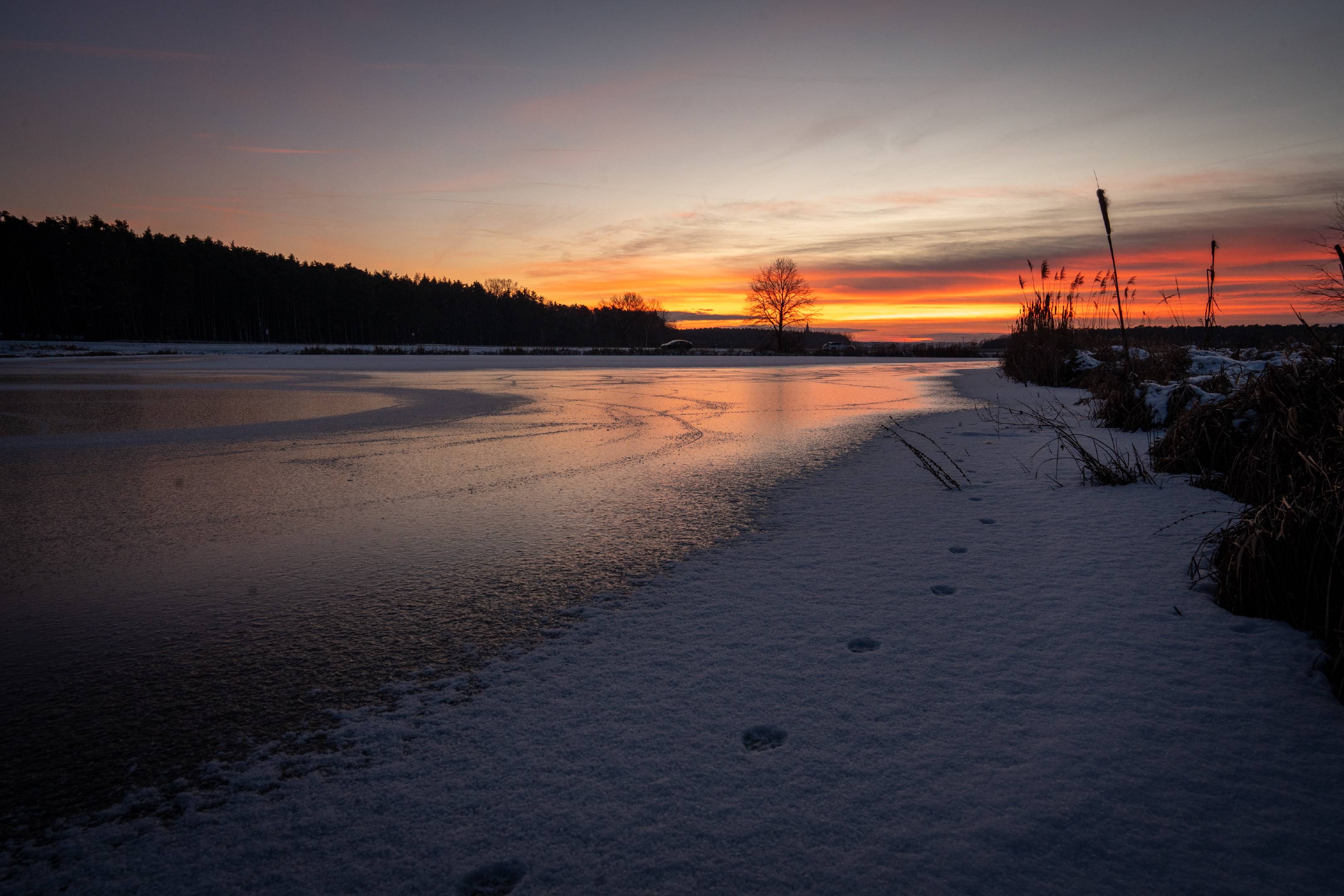 Frozen lake after sunset